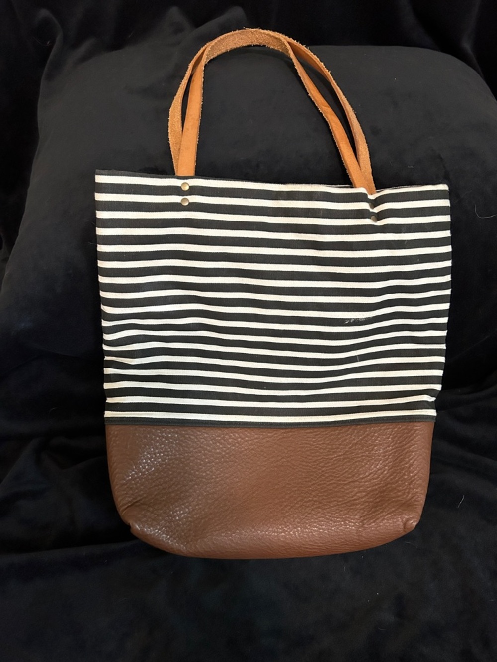 Striped Black & White Canvas Tote with Brown Leather Base, and leather straps.